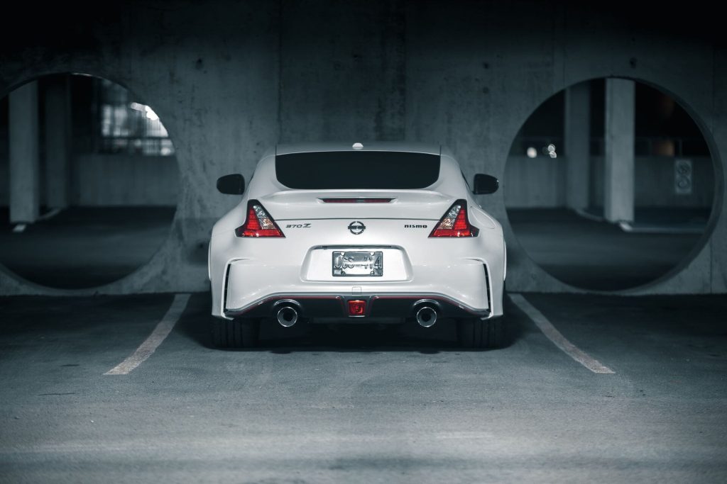 white nissan nismo sports car