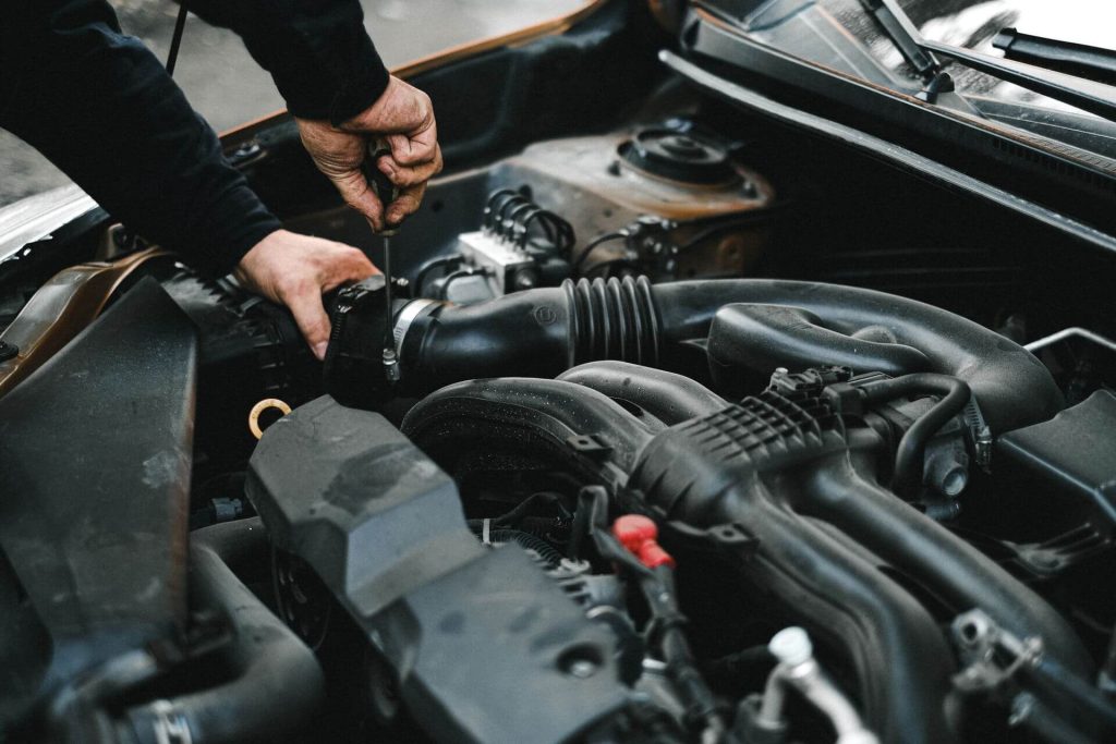 remap chesterfield 9 mechanic repairing car engine compartment